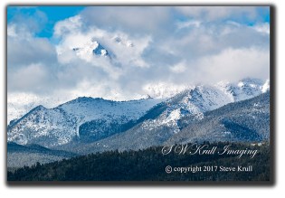 Storm clouds and snow on Pikes Peak Colorado