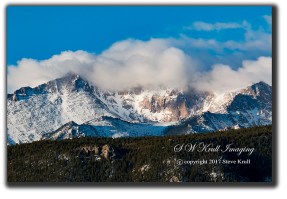 Storm clouds receding from Pikes Peak Colorado