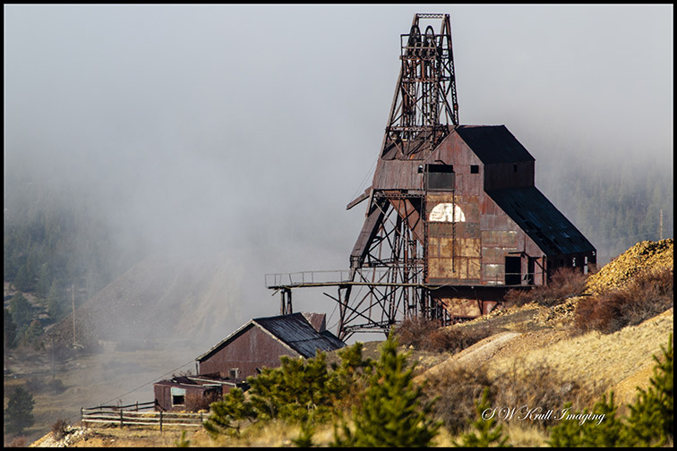 Ghostly Figures in Foggy Mine Country